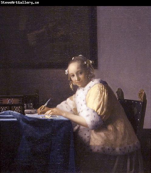 Johannes Vermeer A lady writing.